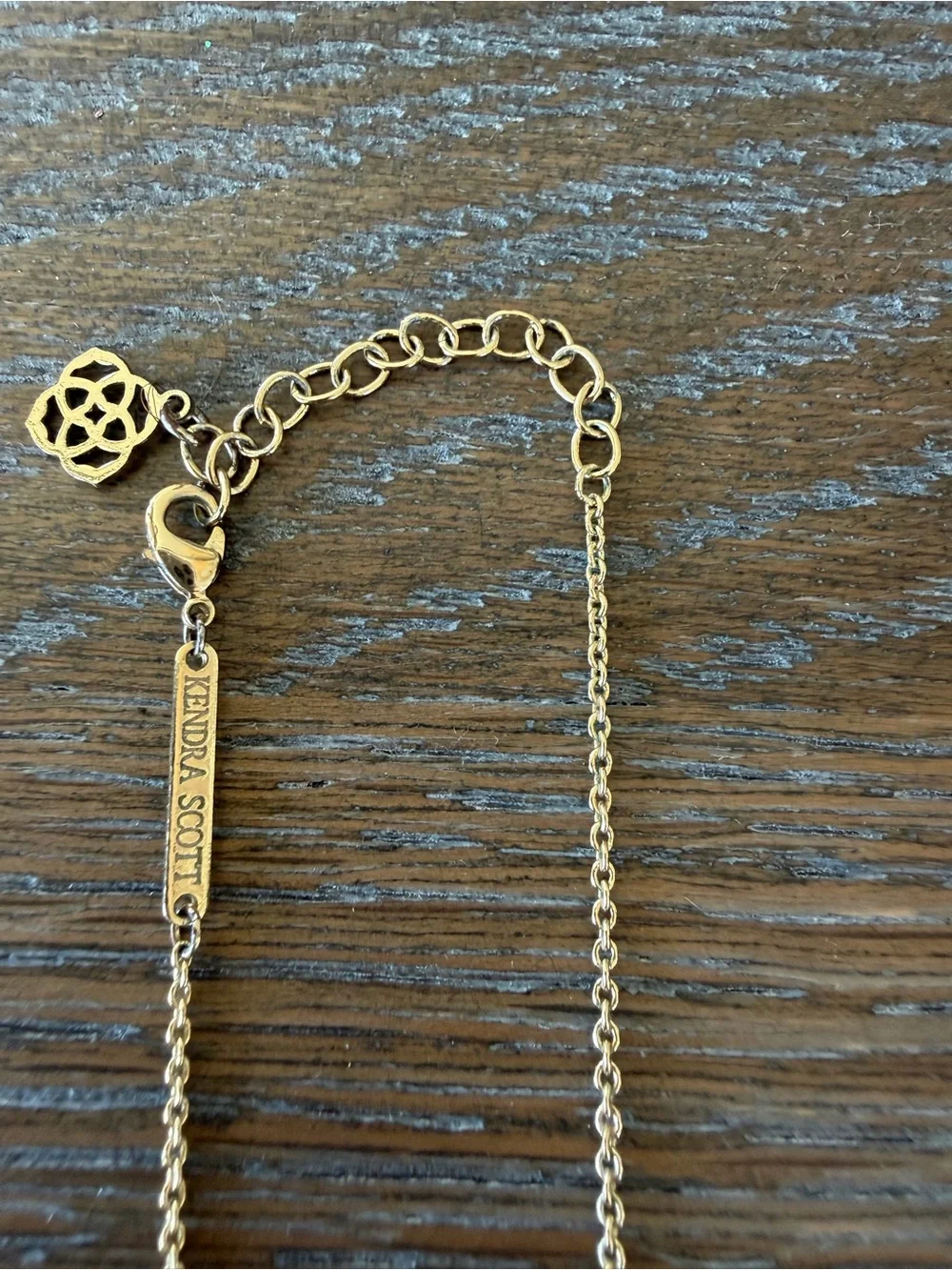 Kendra Scott Gold Necklace with Blue Faceted Pendant